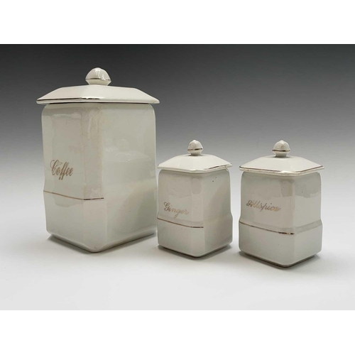 850 - A set of eleven early 20th century 'Empire Ware' kitchen storage jars, comprising five 19cm tall jar... 