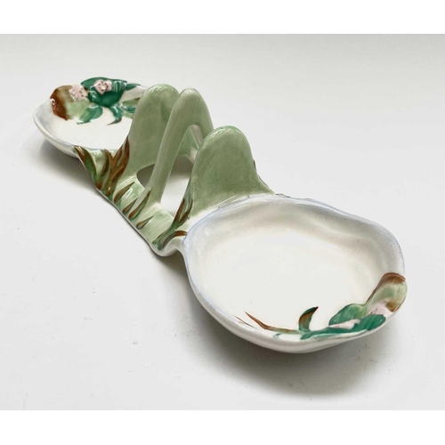 852 - A Clarice Cliff for Newport Pottery 'Water Lily' toast rack, width 20cm, and a Beswick Beatrix Potte... 