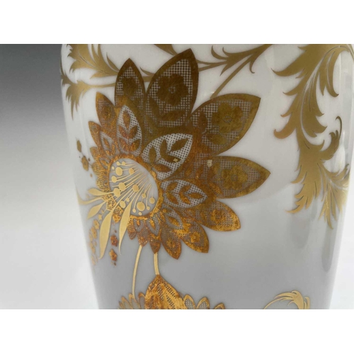 853 - A collection of Bjorn Wiinblad for Rosenthal floral gilt decorated porcelain to include two lidded j... 