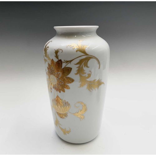 853 - A collection of Bjorn Wiinblad for Rosenthal floral gilt decorated porcelain to include two lidded j... 