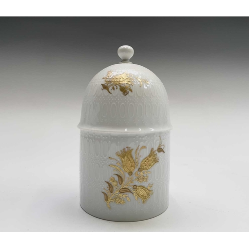 853 - A collection of Bjorn Wiinblad for Rosenthal floral gilt decorated porcelain to include two lidded j... 