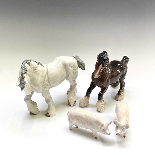 856 - Two Beswick horses - dapple grey large action shire and bay cantering shire - together with a Beswic... 