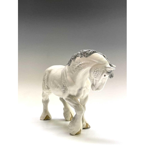 856 - Two Beswick horses - dapple grey large action shire and bay cantering shire - together with a Beswic... 