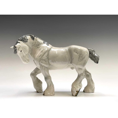 856 - Two Beswick horses - dapple grey large action shire and bay cantering shire - together with a Beswic... 