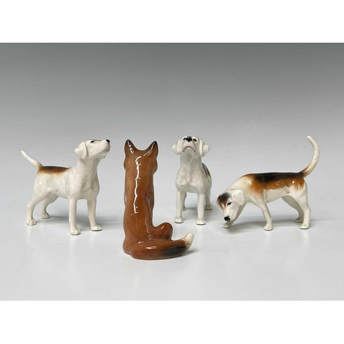 857 - Three Beswick foxhounds and a Beswick seated fox (4).