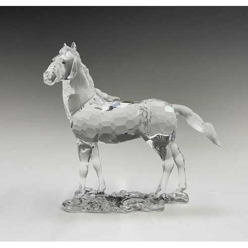 863 - Swarovski Crystal - a standing horse, height 13.5cm, a rearing horse, height 11cm, and a Swarovski C... 