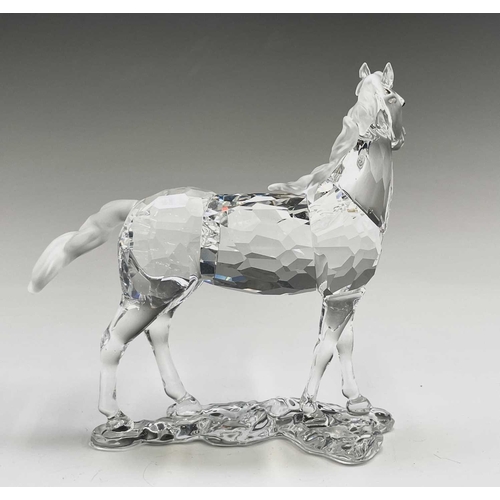 863 - Swarovski Crystal - a standing horse, height 13.5cm, a rearing horse, height 11cm, and a Swarovski C... 