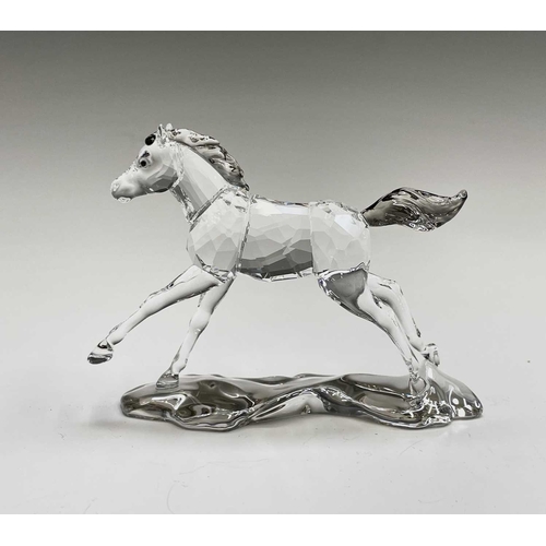 863 - Swarovski Crystal - a standing horse, height 13.5cm, a rearing horse, height 11cm, and a Swarovski C... 