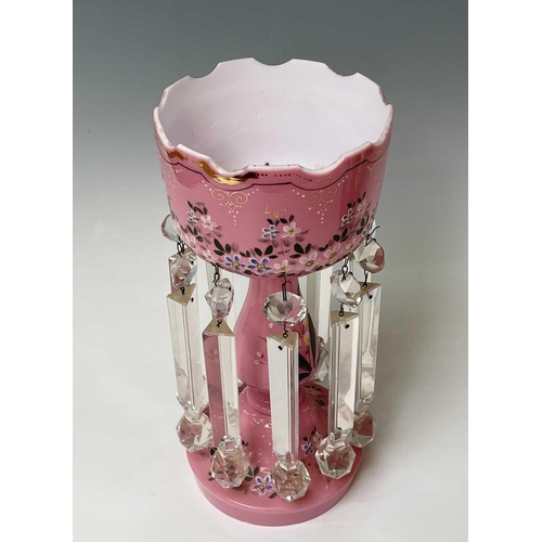 864 - A pair of Victorian pink opaque glass lustre vases, with floral enamel and gilt painted decoration, ... 