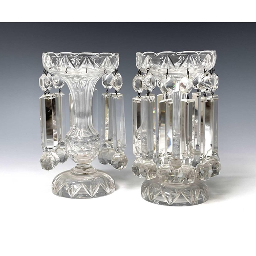 865 - A pair of cut glass lustre vases, circa 1900, the triangular section drops with faceted terminals, h... 