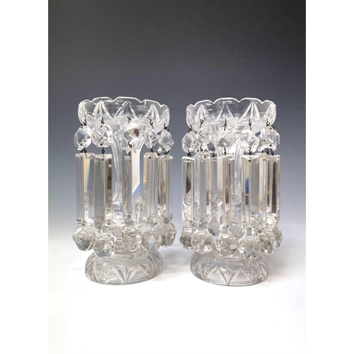 865 - A pair of cut glass lustre vases, circa 1900, the triangular section drops with faceted terminals, h... 