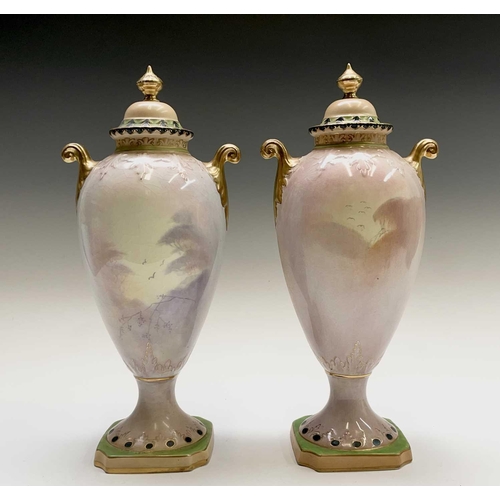 867 - A pair of Fielding & Co Crown Devon vases and covers, one with coloured decoration of pheasants, sig... 