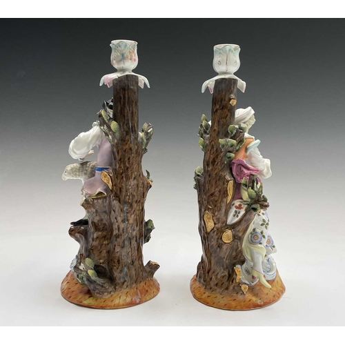 868 - A pair of Helena Wolfsohn porcelain candlestick figures, modelled as a shepherd and his companion we... 