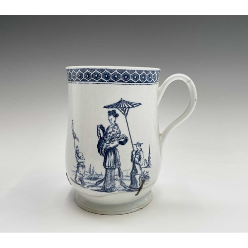 876 - An 18th century blue and white bell form mug, possibly Liverpool, printed to one side with an Orient... 