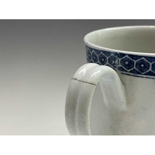 876 - An 18th century blue and white bell form mug, possibly Liverpool, printed to one side with an Orient... 