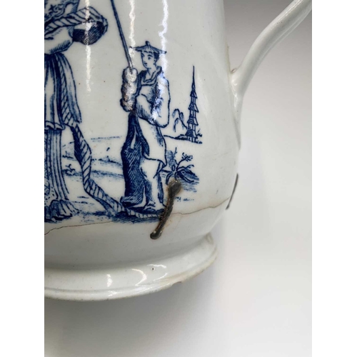 876 - An 18th century blue and white bell form mug, possibly Liverpool, printed to one side with an Orient... 