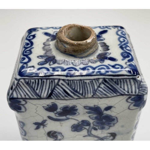 877 - A Dutch Delft tea caddy, 18th century, of rectangular section, painted in blue and white with Chines... 