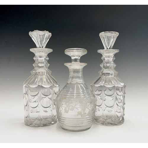 881 - A pair of Victorian cut glass decanters and stoppers, with drape cut sides, height 28.5cm, together ... 