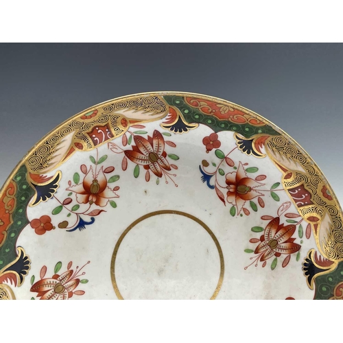 884 - A Newhall porcelain tea bowl and saucer, painted in the butterfly pattern, together with other porce... 