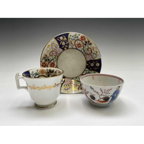 884 - A Newhall porcelain tea bowl and saucer, painted in the butterfly pattern, together with other porce... 