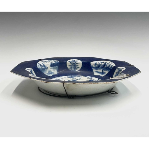 886 - A bow porcelain octagonal soup bowl, the powder blue ground painted with a central chinoiserie lands... 