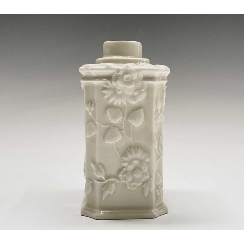 891 - A Continental white porcelain tea caddy, 19th century, moulded with flowers and foliage, height 11cm... 