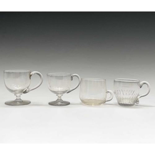 898 - A selection of Georgian and later glass to include a toddy lifter, a jelly mould (?), three spirit d... 