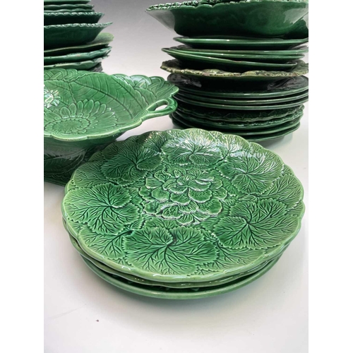 902 - A Victorian Wedgwood green sunflower moulded dessert dish, together with a quantity of other similar... 