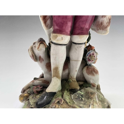 903 - A Chelsea porcelain figure of a sportsman, circa 1760, with a dog at his feet, height 21.5cm, togeth... 