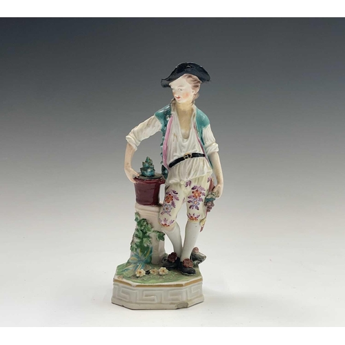 903 - A Chelsea porcelain figure of a sportsman, circa 1760, with a dog at his feet, height 21.5cm, togeth... 