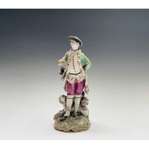 903 - A Chelsea porcelain figure of a sportsman, circa 1760, with a dog at his feet, height 21.5cm, togeth... 