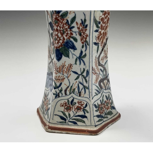 904 - A pair of Dutch Delft polychrome vases, 18th century, of hexagonal tapered form, painted in the Chin... 