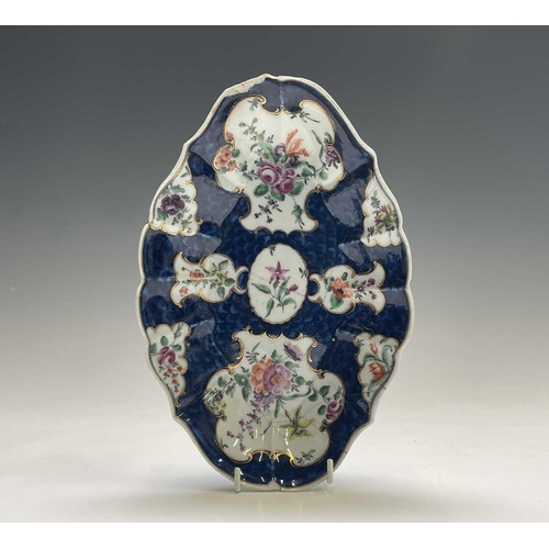 907 - A Worcester porcelain dish, circa 1770, the blue scale ground with floral reserves, blue seal mark, ... 