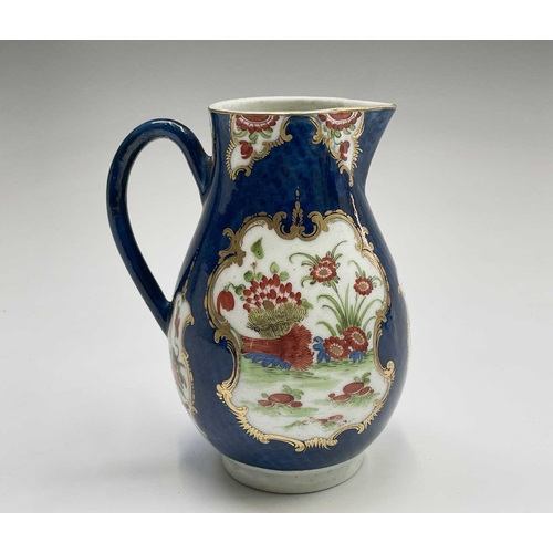 908 - A Worcester jug, circa 1770, the blue scale ground decorated with gilt edged floral panels, crescent... 