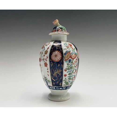 914 - A Worcester porcelain tea caddy and cover, circa 1780, of fluted ovoid form, decorated with Kakiemon... 