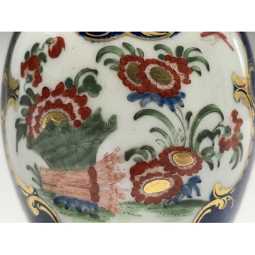 914 - A Worcester porcelain tea caddy and cover, circa 1780, of fluted ovoid form, decorated with Kakiemon... 