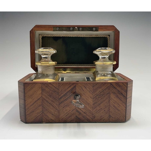 918 - A French kingwood perfume casket, circa 1880, with parquetry and inlaid decoration, containing two (... 