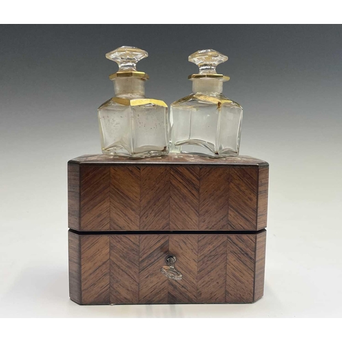 918 - A French kingwood perfume casket, circa 1880, with parquetry and inlaid decoration, containing two (... 