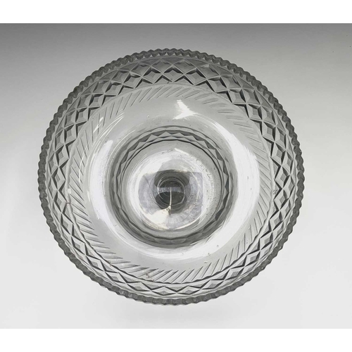 921 - A Georgian cut glass pedestal bowl, with serrated rim, hobnail cut lozenges and lemon squeezer base,... 