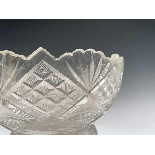 922 - A cut glass pedestal bowl, 19th century, with hobnail cut panels on a circular foot, height 21cm, di... 