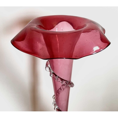 925 - A Victorian cranberry glass single spill epergne, circular base with a frilled edge, height 53cm.