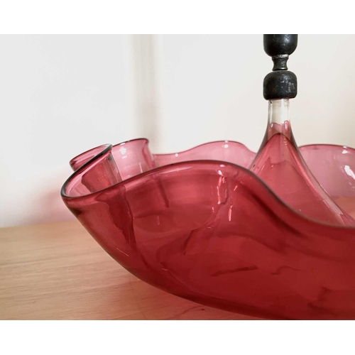 925 - A Victorian cranberry glass single spill epergne, circular base with a frilled edge, height 53cm.