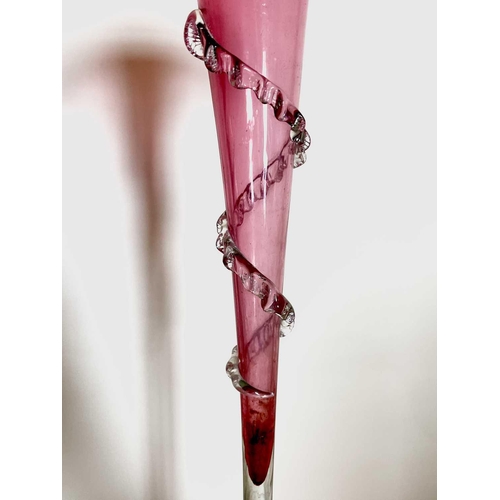 925 - A Victorian cranberry glass single spill epergne, circular base with a frilled edge, height 53cm.