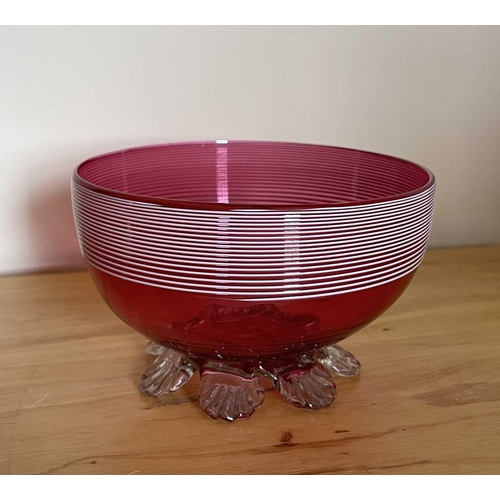 926 - A Victorian cranberry glass bowl with applied white trailing decoration, diameter 14cm, together wit... 