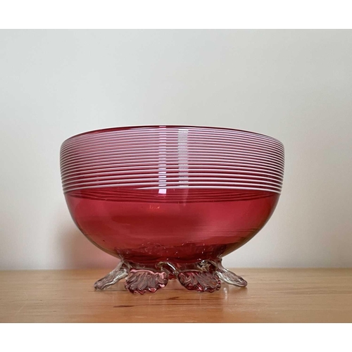 926 - A Victorian cranberry glass bowl with applied white trailing decoration, diameter 14cm, together wit... 