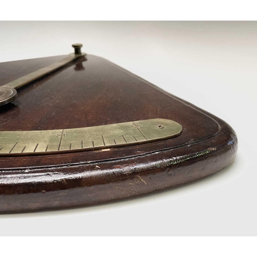 93 - A ship's brass inclinometer, 20th century, on a stained wood base, height 48.5cm.