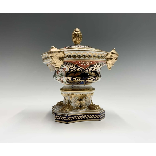 933 - A pair of early 19th century Derby porcelain imari and gilt decorated pot pourri vases, of squat for... 