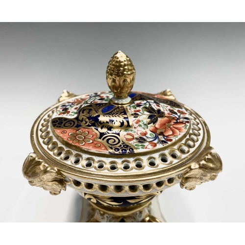 933 - A pair of early 19th century Derby porcelain imari and gilt decorated pot pourri vases, of squat for... 