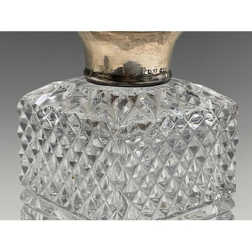 944 - A silver mounted cut glass decanter and stopper, of square section, height 24cm.