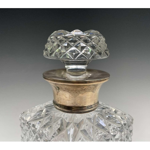 944 - A silver mounted cut glass decanter and stopper, of square section, height 24cm.